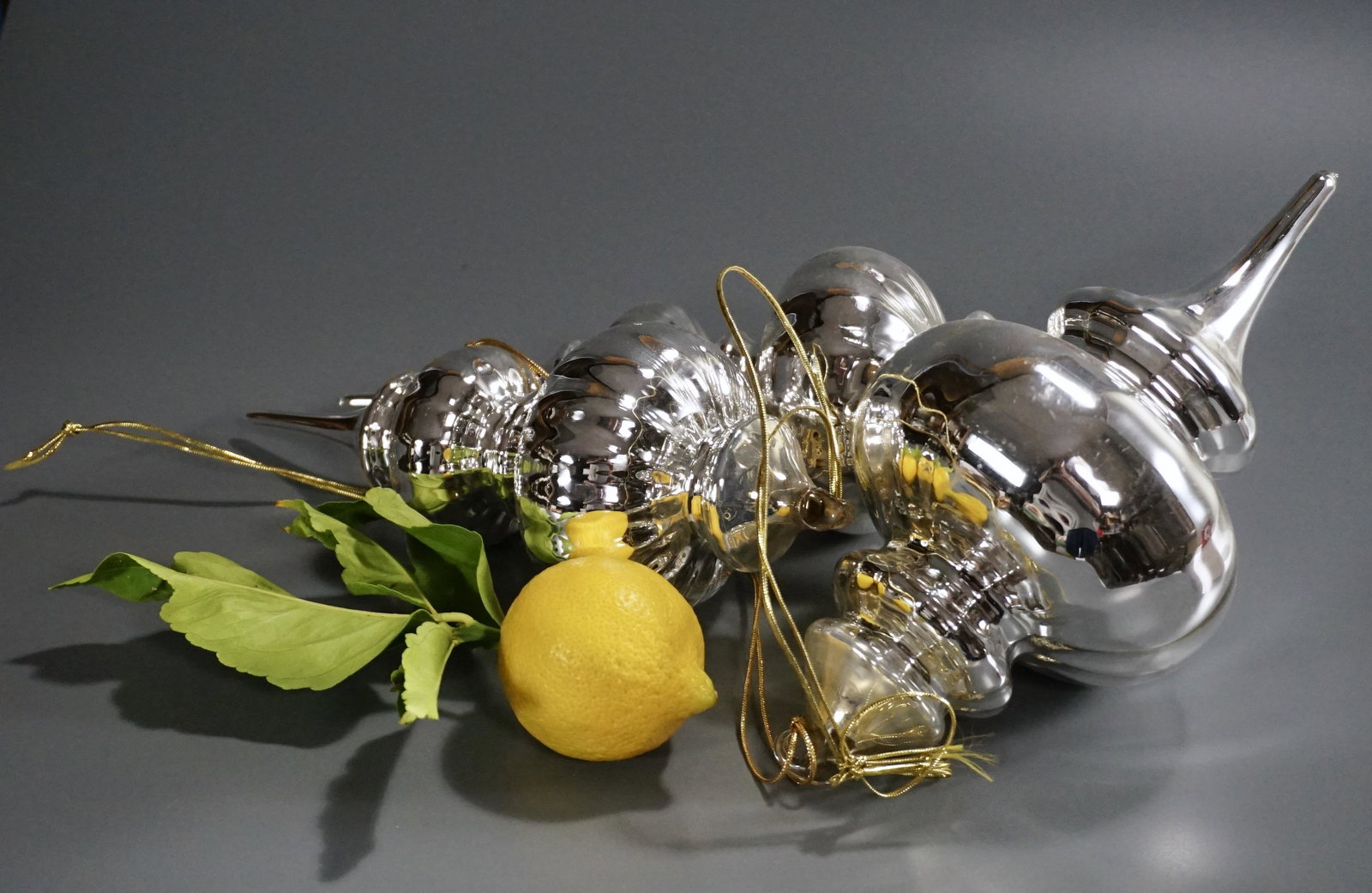 Large Blown Mercury Glass Silver Christmas Ornaments: Large Blown Mercury Glass Silver Christmas Ornaments Lot of 3 Approximately from 9 1/2 to 9 5/8 inches.