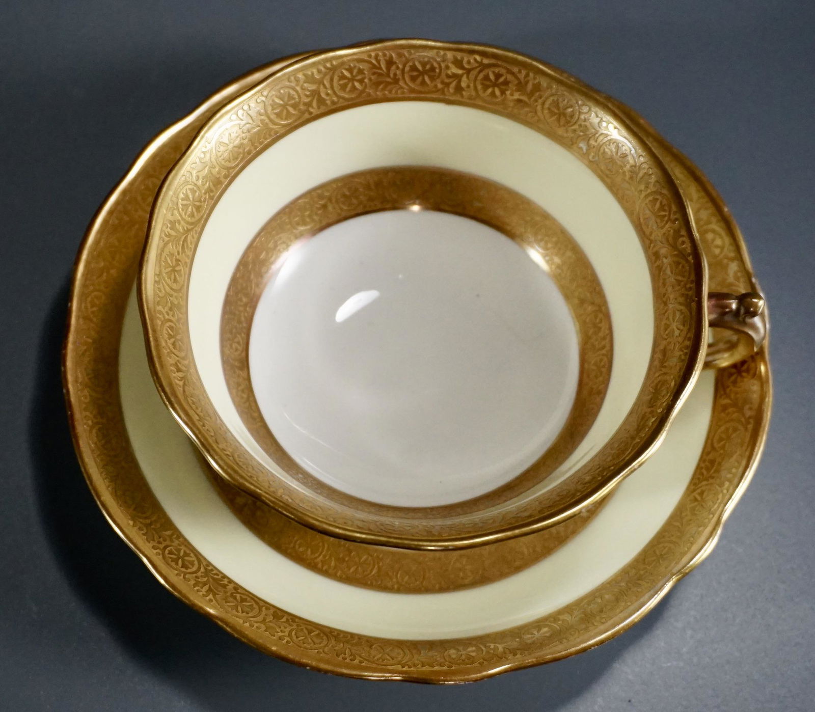 Adderleys Gold Encrusted Vintage Tea Cup Saucer Set: Adderleys Gold Encrusted Vintage Tea Cup Saucer SetFine Bone China England Cup is approximately 4 5/8 x 4 1/16 x 1 1/8 inches tall; the saucer is about 5 17/16 inches in diameter.
