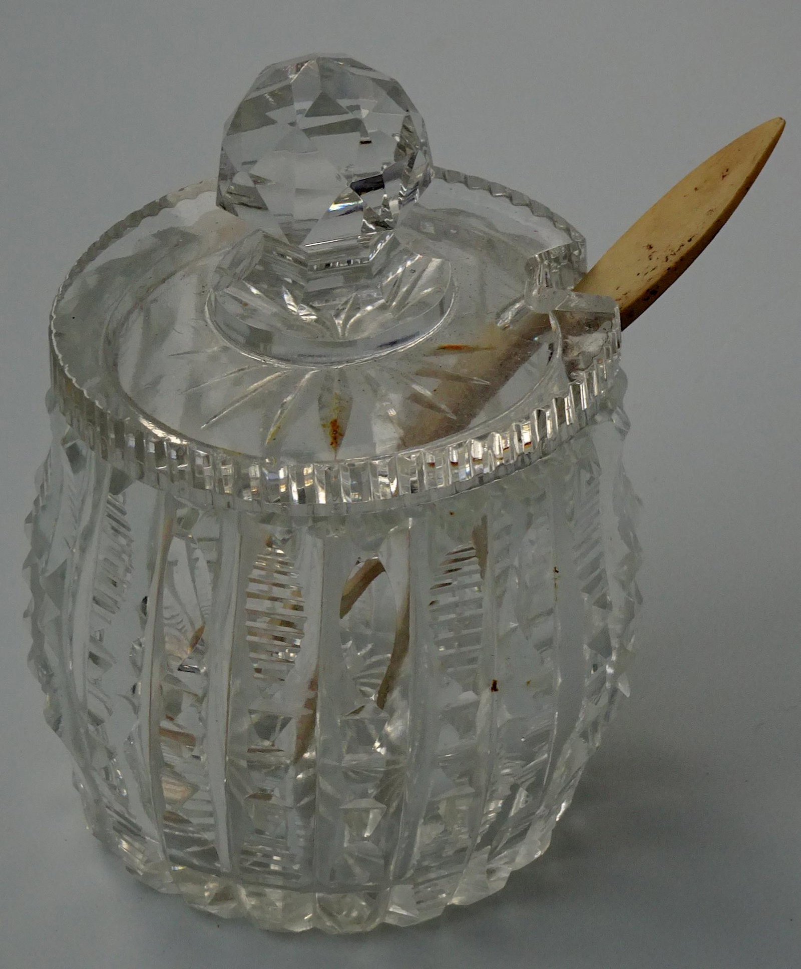 Antique Cut Glass Jelly Condiment Mustard Jar Carved: Antique Cut Glass Jelly Condiment Mustard Jar Carved Spoon Approximately 3 3/4 inches tall x 2 5/8 inches in diameter; spoon is 4 1/8 inches.