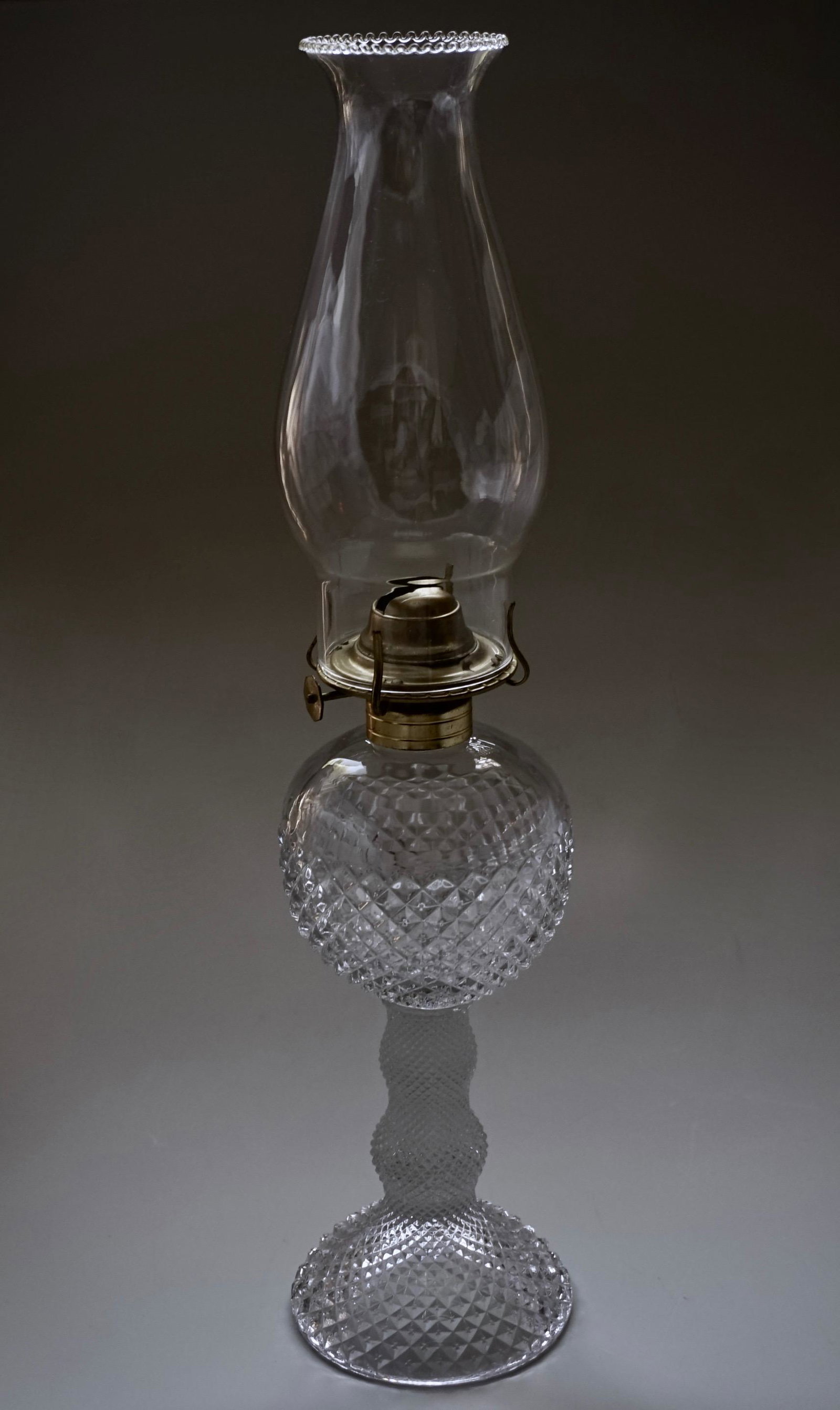 English Westmoreland Hobnail Glass Kerosene Lamp with: English Westmoreland Hobnail Glass Kerosene Lamp with Chimney Approximately 17 1/2 inches tall overall, 9 3/8 inches tall up to the collar, on 4 inches in diameter base.
