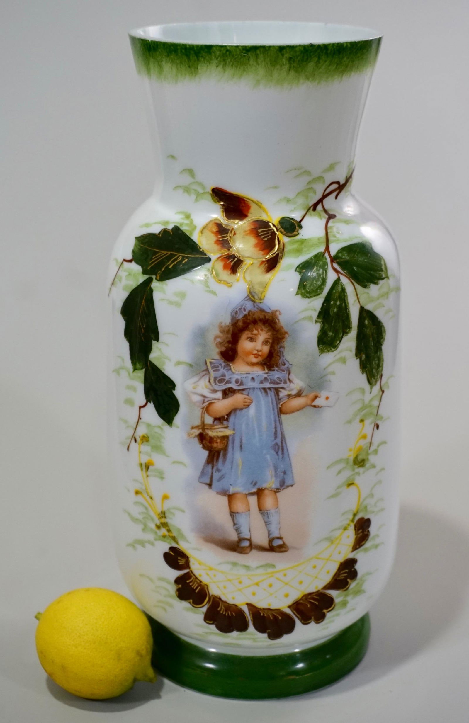 Antique Victorian Milk Glass Vase Messenger Girl: Antique Victorian Milk Glass Vase Messenger Girl Carrying Letter Approximately 4 3/8 inches in diameter x 10 3/16 inches tall.