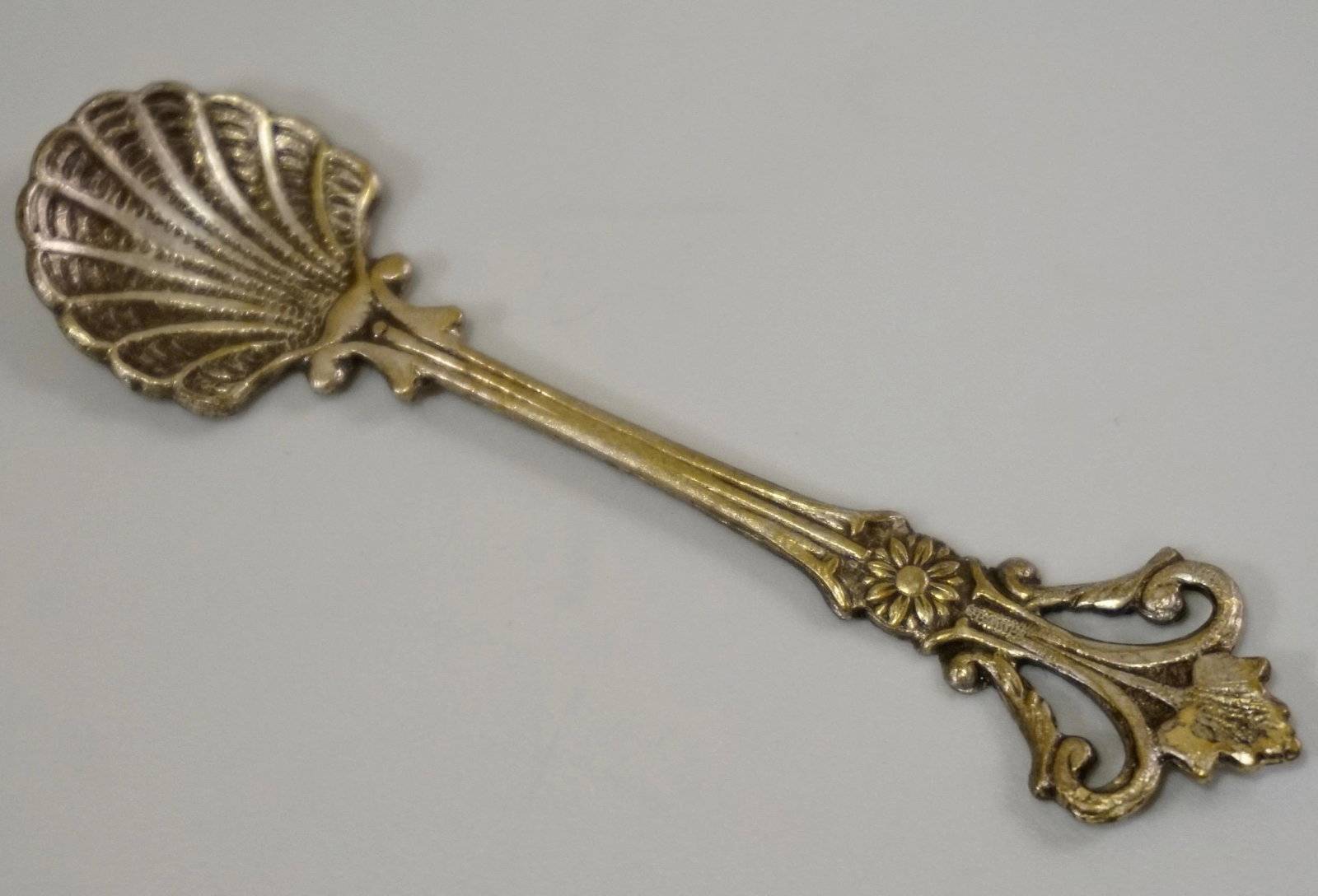 Rococo Shell Salt Spoon: Rococo Shell Salt Spoon Approximately 2 11/16 inches.