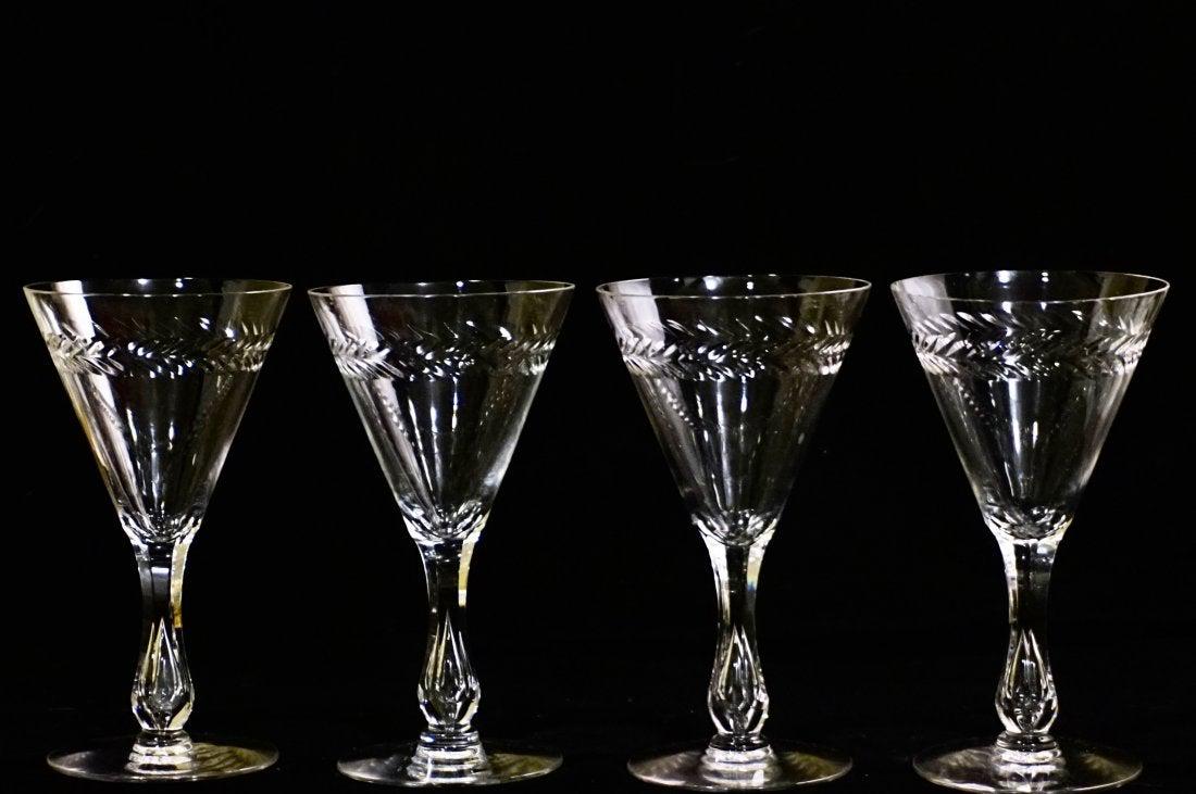 Faceted Crystal Stem Laurel Pattern Cut Glass Goblets: Faceted Crystal Stem Laurel Pattern Cut Glass Goblets Lot of 4 Large Vintage Wine Glasses Approximately inches x inches in diameter.