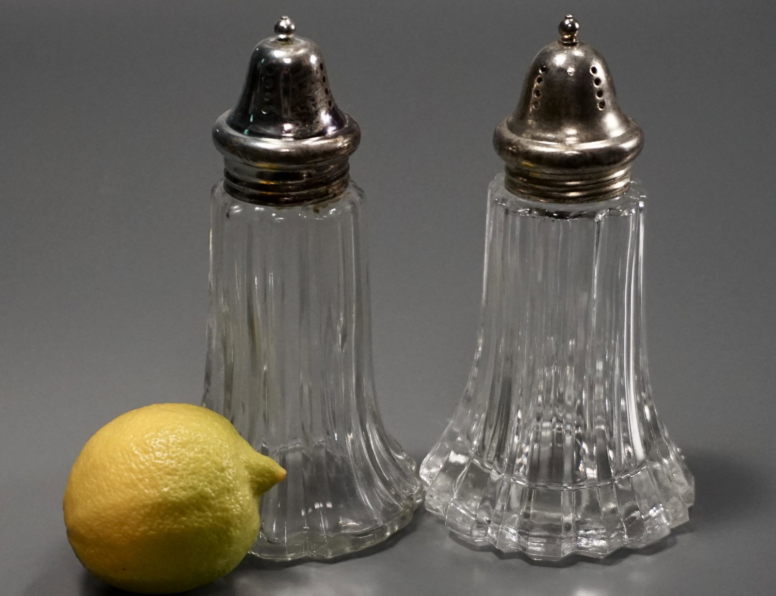 Large Pressed Glass Salt and Pepper Shakers Lot of 2: Large Pressed Glass Salt and Pepper Shakers Lot of 2 Approximately 5 7/8 inches tall.