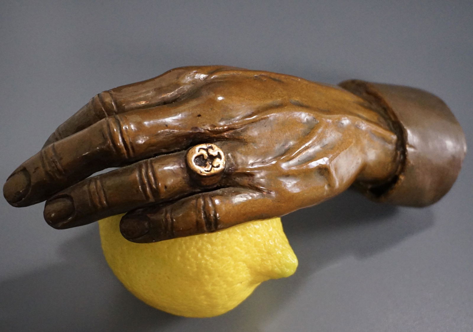 Heavy Bronze Hand Paperweight: Heavy Bronze Hand Paperweight Approximately 6 1/8 x 2 11/16 x 1 7/8 inches.