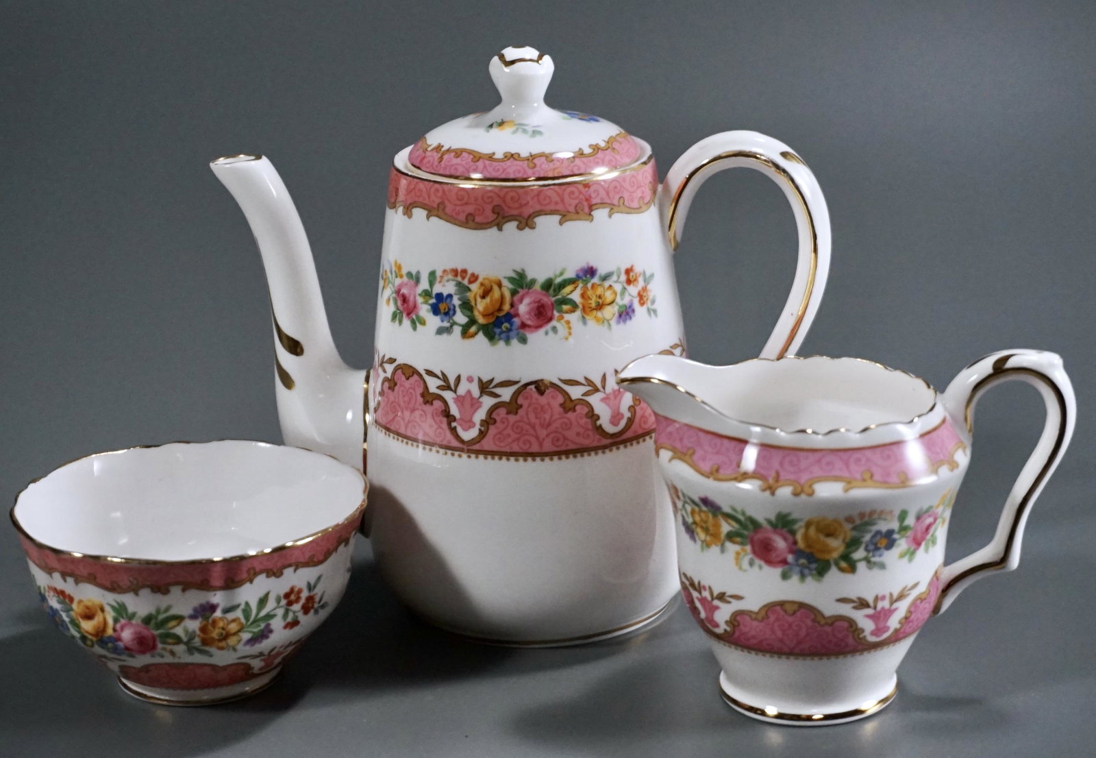Crown Staffordshire Fine Bone China Tea Coffee Set: Crown Staffordshire Fine Bone China Tea Coffee Set Creamer is about 4 x 2 3/4 x 3 inches tall, the sugar bowl is approximately 1 3/4 inches tall x 3 1/8 inches in diameter, and the pot is about 5 3/4 