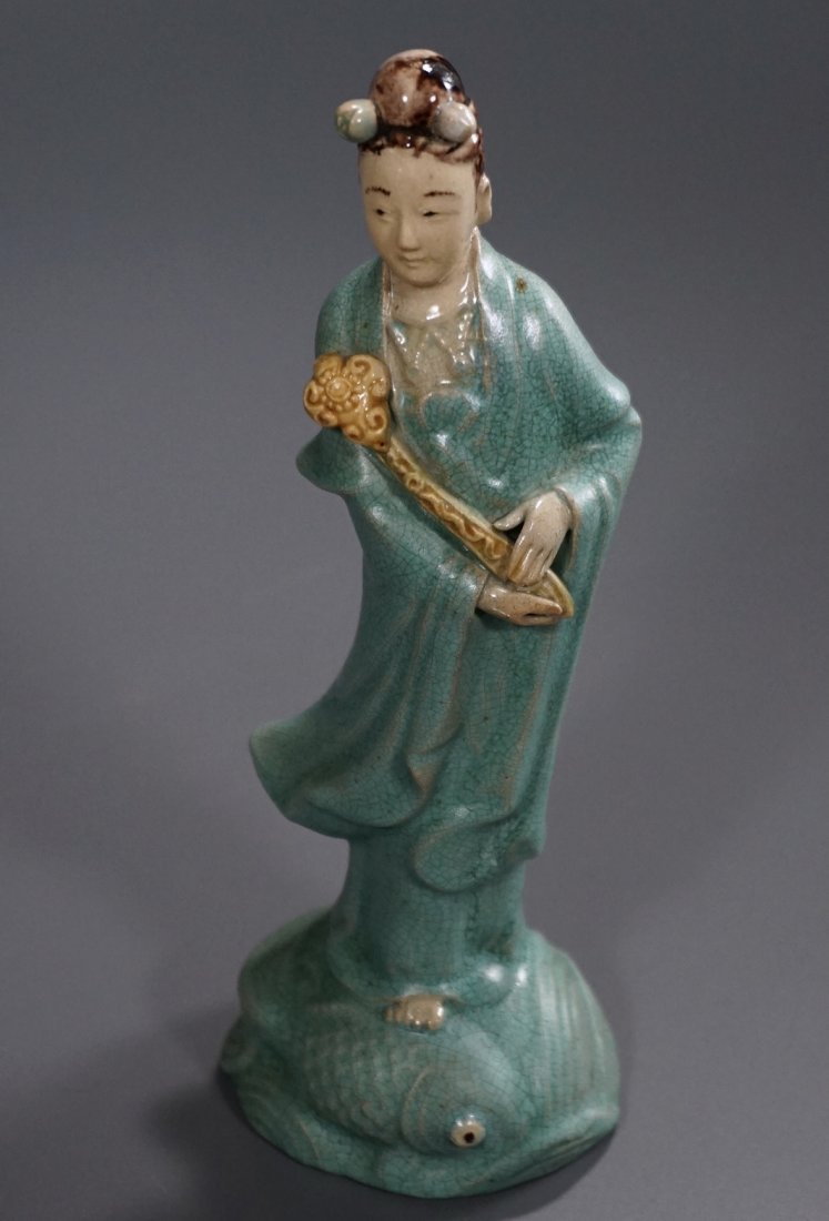 Chinese Pottery Guanyin Figurine Koi Fish Ruyi Scepter: Chinese Pottery Guanyin Figurine Koi Fish Ruyi Scepter Kwan Yin Approximately 7 7/8 inches tall.