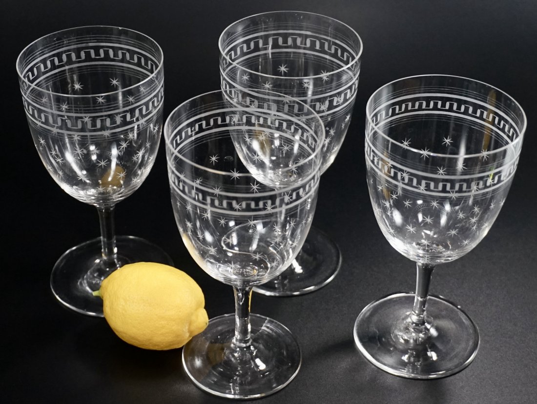 Antique French Baccarat Needle Etched Star Wine Goblets: Antique French Baccarat Needle Etched Star Cut Wine Goblets Lot of 4 Approximately 6 7/16 inches tall x 3 1/4 inches in diameter.