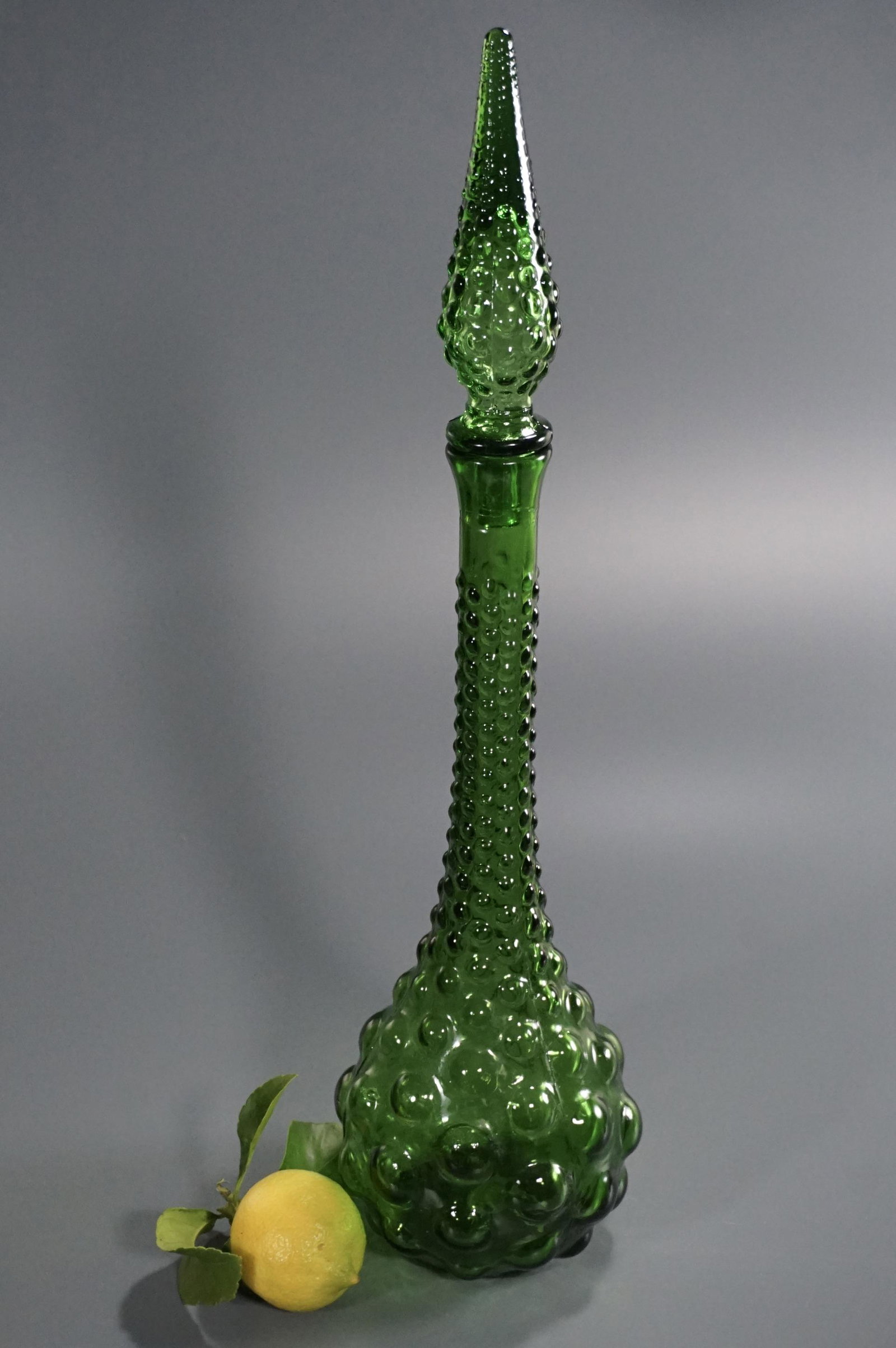 Empoli Genie Vintage Mid Century Tall Green Glass: Empoli Genie Vintage Mid Century Tall Green Glass Bottle Decanter Approximately 20 inches tall overall.