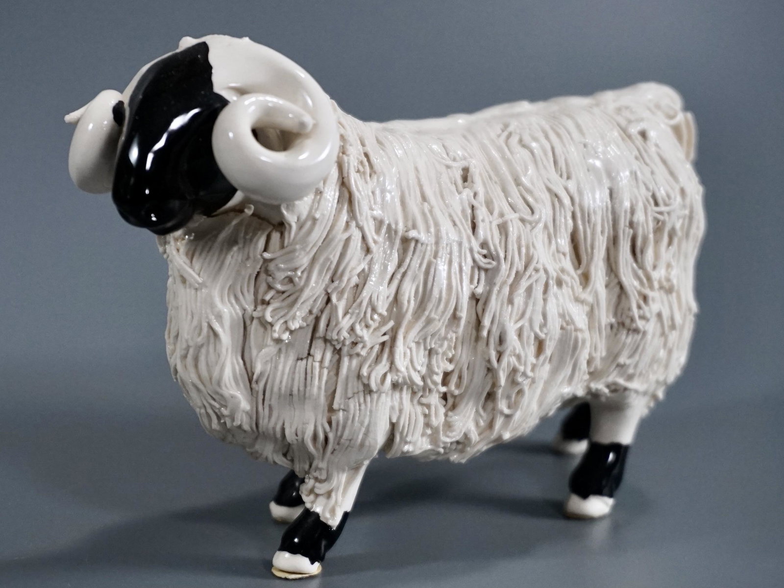 Spaghetti Pottery Ram Figurine Tom Mackie Hand Molded: Spaghetti Pottery Ram Figurine Tom Mackie Hand Molded Scottish Blackface Sheep Approximately 6 1/4 x 2 3/8 x 4 inches tall.