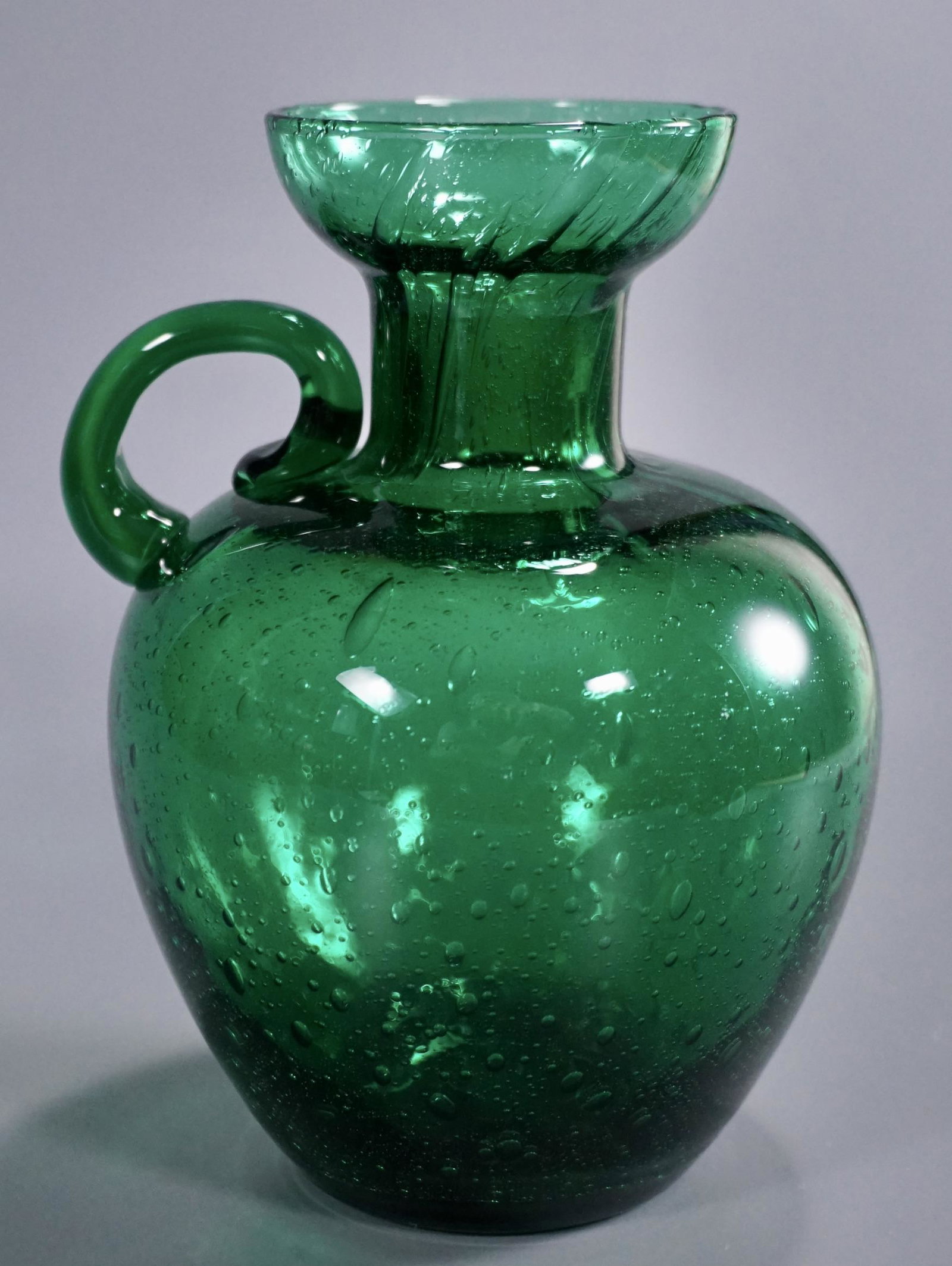 Mid Century Seeded Green Glass Pitcher: Mid Century Seeded Green Glass Pitcher Approximately 6 inches tall.