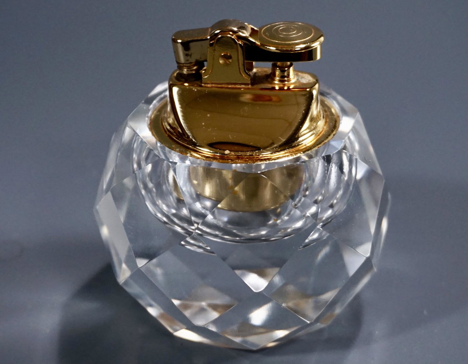 Faceted Crystal Ball Table Lighter: Faceted Crystal Ball Table Lighter Approximately 3 1/8 inches tall.