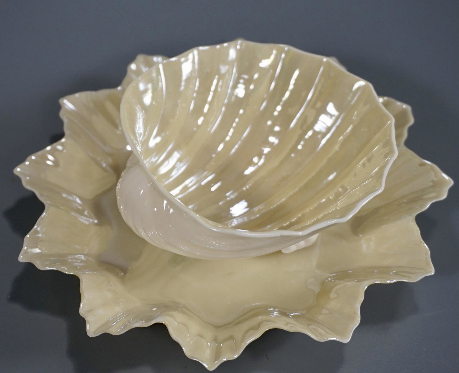 Belleek Shell Bowl and Plate Paper Thin Irish Porcelain: Belleek Shell Bowl and Plate Paper Thin Irish Porcelain Approximately 3 3/4 x 3 7/8 x 1 5/8 inches tall and the plate is about 6 inches in diameter.