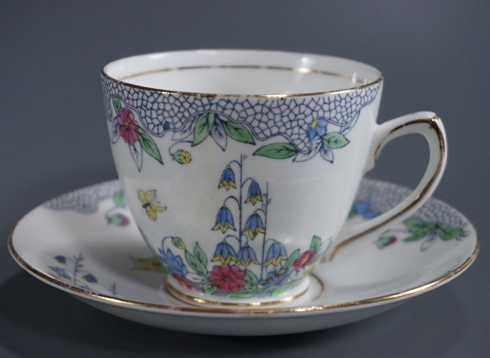 Rosina Bone China English Tea Cup Saucer Set: Rosina Bone China English Tea Cup Saucer Set Cup is approximately 4 x 3 3/16 x 2 9/16 inches tall; the saucer is approximately 5 1/2 inches in diameter.