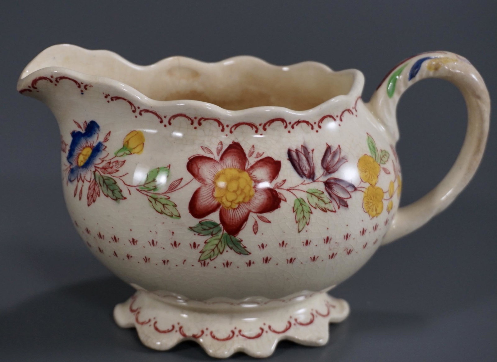 Mason's Arbor Ironstone China Creamer: Mason's Arbor Ironstone China Creamer Approximately 5 5/8 x 3 x 3 1/2 inches tall.