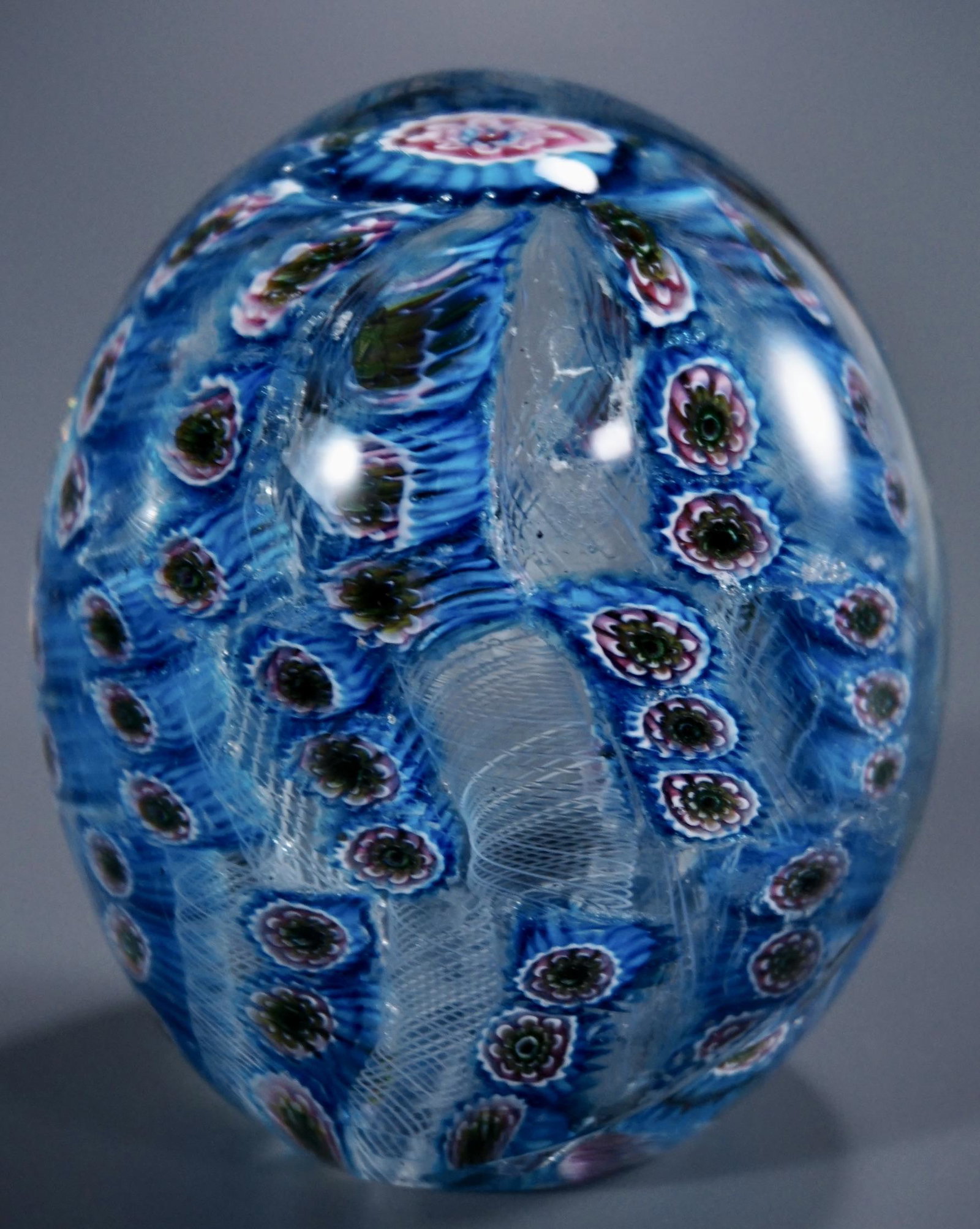 Italian Art Glass Millefiori Latticino Egg Paperweight: Italian Art Glass Millefiori Latticino Egg Paperweight Approximately 3 1/4 inches tall.
