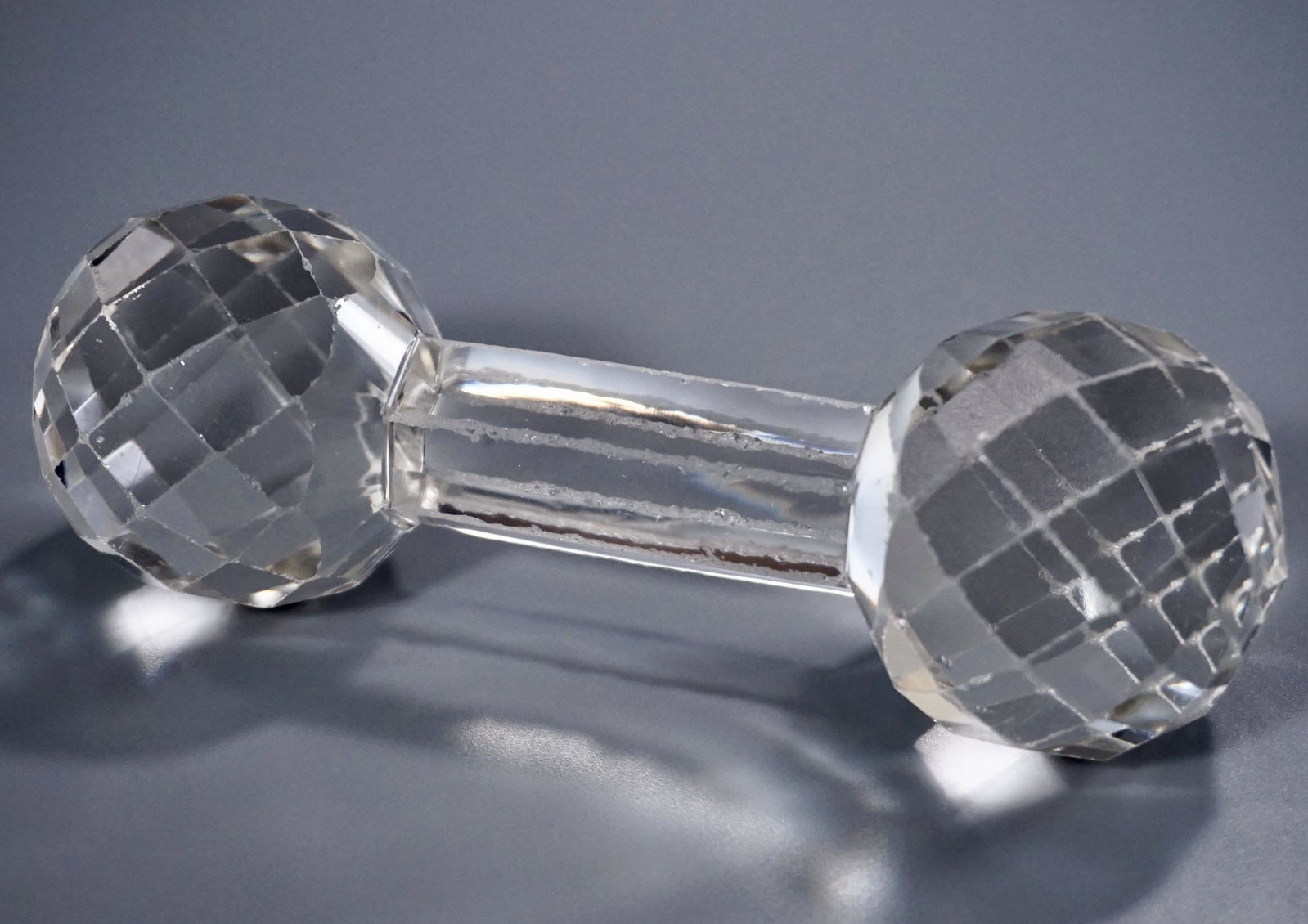 Vintage Faceted Glass Dumbbell Knife Rest: Vintage Faceted Glass Dumbbell Knife Rest Approximately 5 1/2 inches.