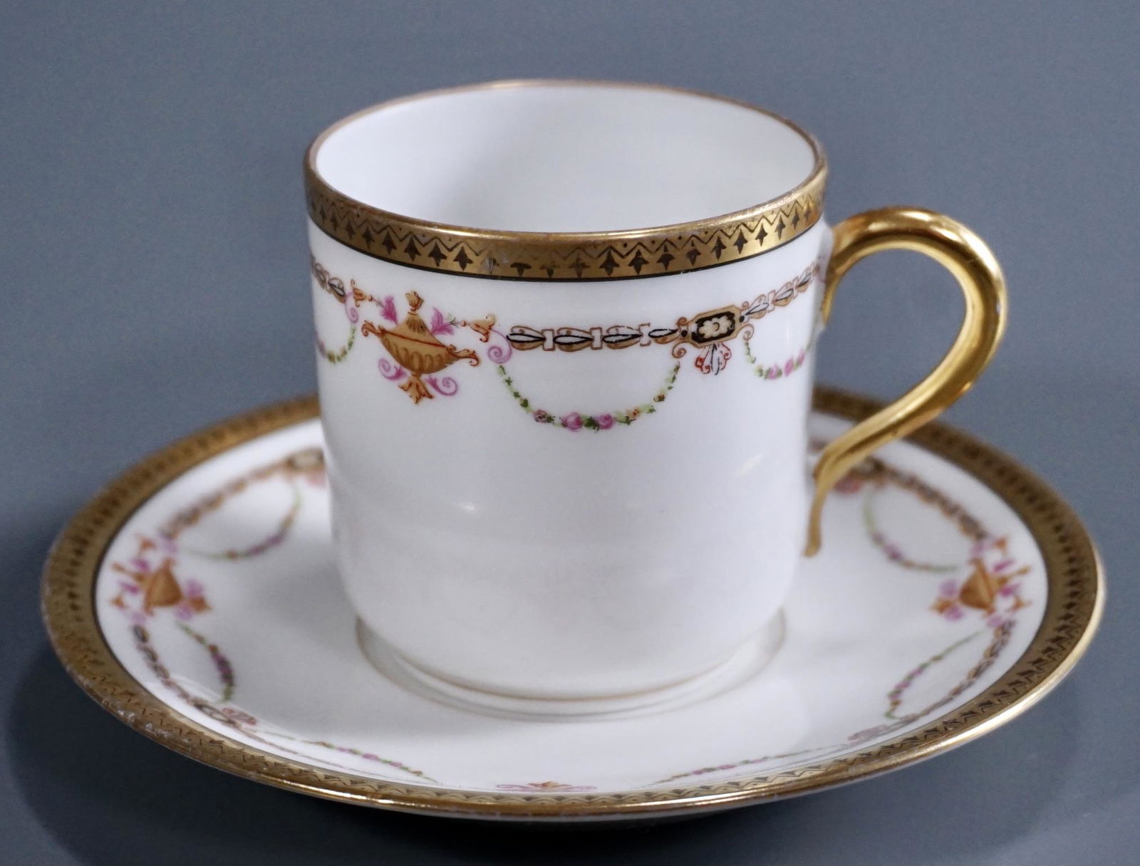 L. Bernardaud & Cie French Limoges Porcelain Demitasse: L. Bernardaud & Cie French Limoges Porcelain Demitasse Cup Saucer Set Cup is approximately 2 7/8 x 2 3/16 x 2 1/4 inches tall; the saucer is about 4 5/8 inches in diameter.