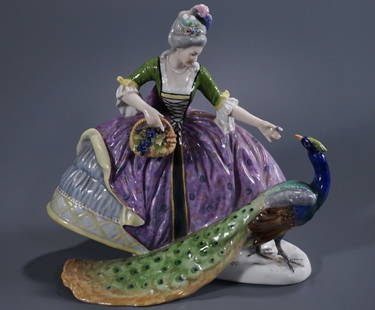 Antique Porcelain Figural Group Feeding Peacock Blue: Antique Porcelain Figural Group Feeding Peacock Blue Five Prong Blue Crown N Mark Ernst Bohne Sohne Rudolstadt Volkstedt Thuringia Germany Approximately 9 1/8 x 6 1/2 x 9 1/8 inches tall.