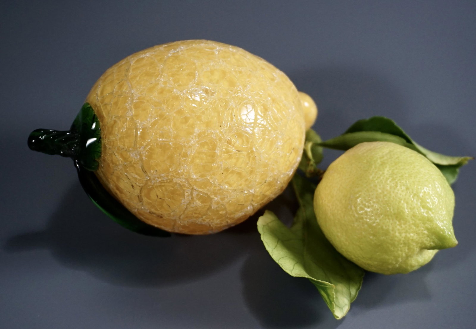 Murano Crackle Glass Lemon Figural Paperweight: Murano Crackle Glass Lemon Figural Paperweight Approximately 4 7/8 x 3 x 3 inches.
