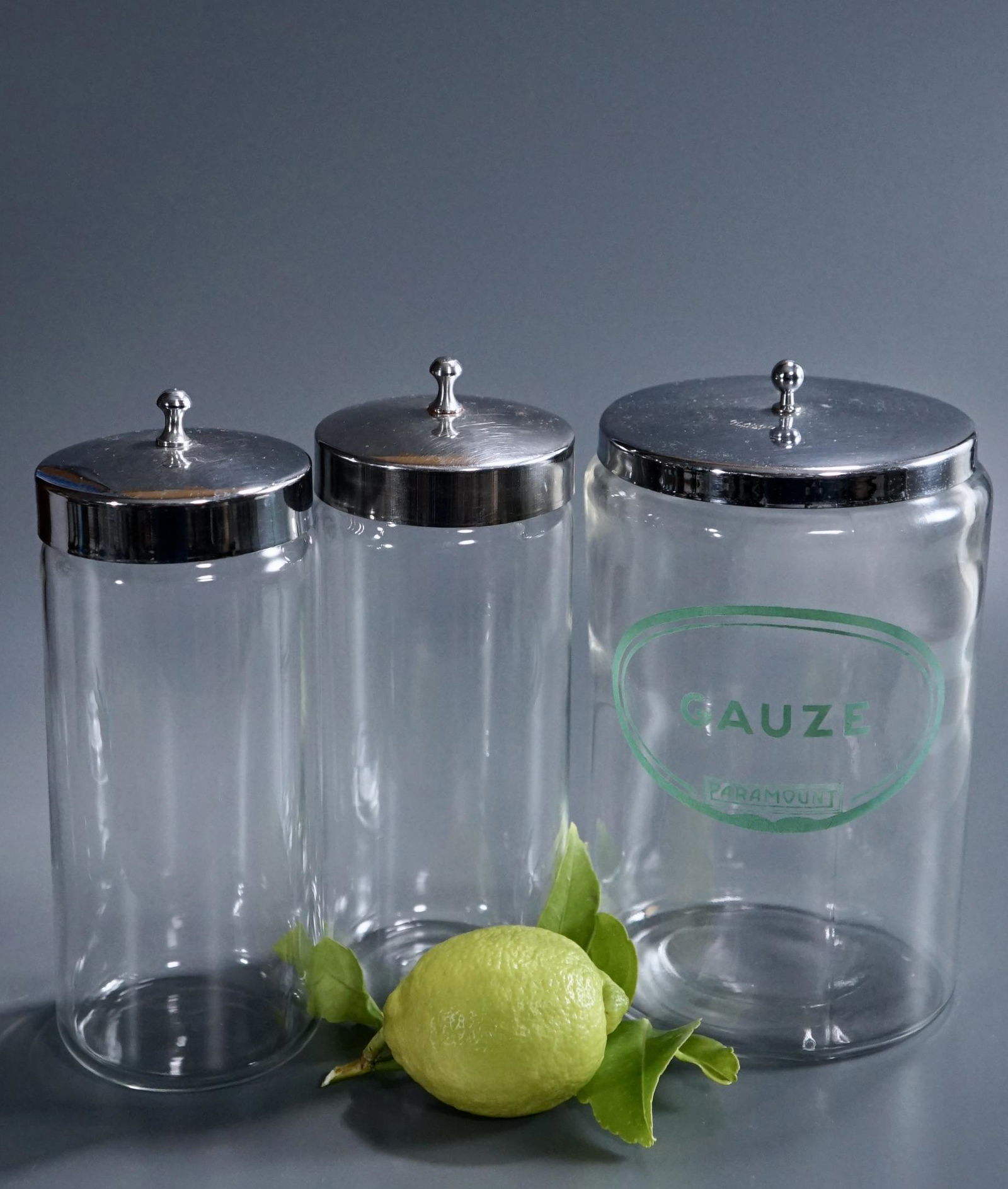 Pyrex Chrome Lid Jar Canister Lot of 3 Cans: Pyrex Chrome Lid Jar Canister Lot of 3 Cans Approximately 2 15/16 inches in diameter x 7 5/8 inches tall overall and 4 1/4 inches in diameter x 7 5/8 inches tall overall.