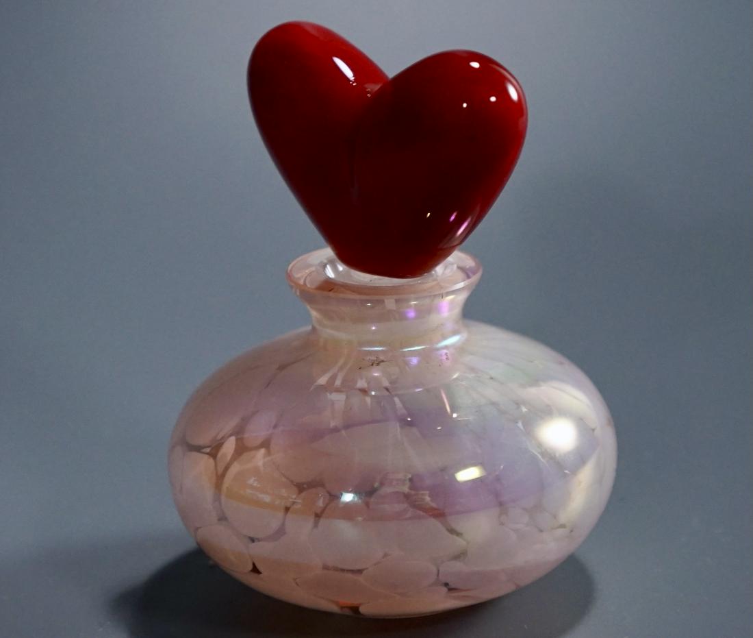 Red Heart Stopper Iridescent Art Glass Perfume Bottle: Red Heart Stopper Iridescent Art Glass Perfume Bottle Approximately 3 3/8 inches tall.