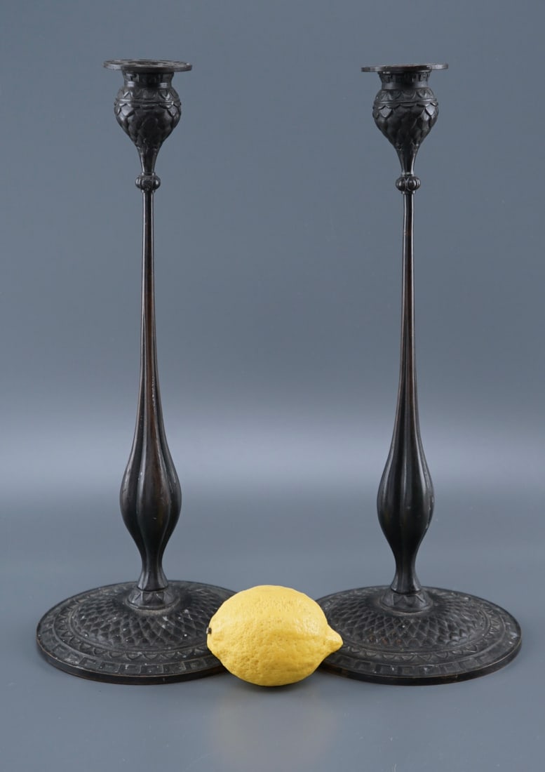 Tiffany Studios Manner Bronze Candlesticks Pair Tall Candleholders Art & Craft Style Original: Tiffany Studios Manner Bronze Candlesticks Pair Tall Candleholders Art & Craft Style Original Bobeches Apparently Unsigned Approximately 14 5/8 inches tall on 6 inches in diameter base. Shipping Estim