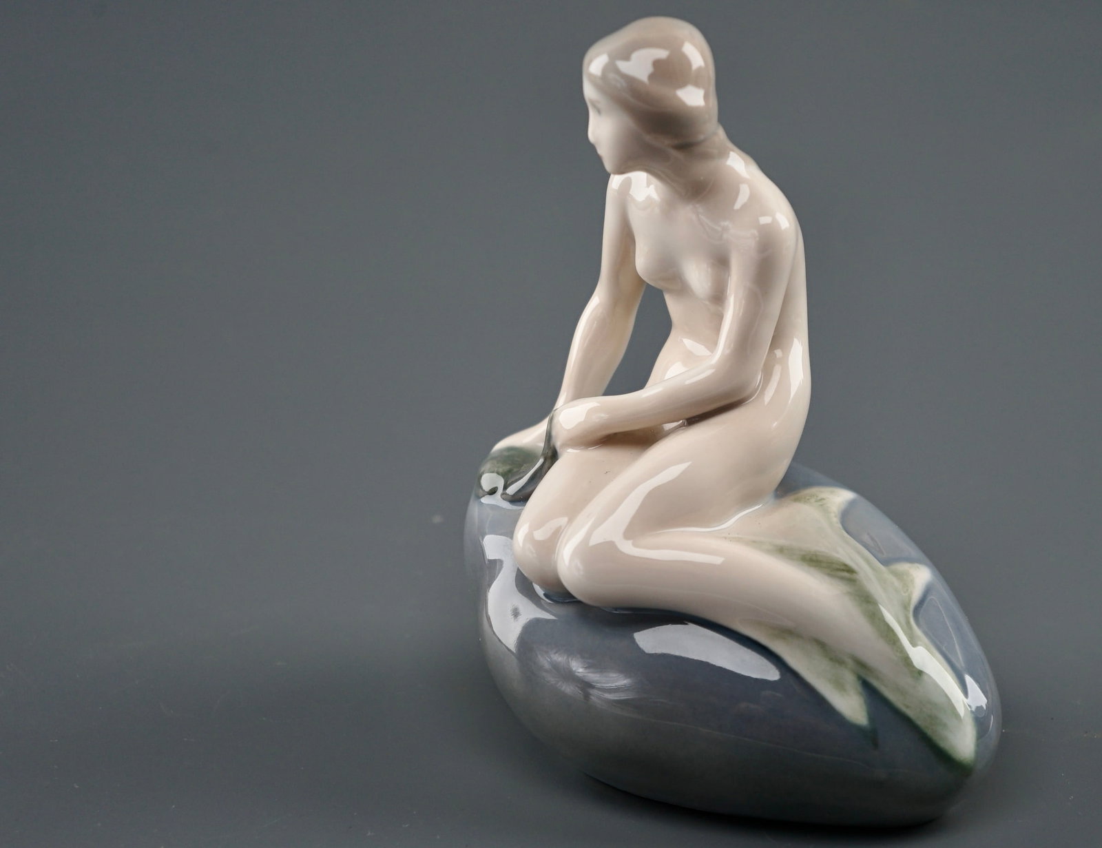 Vintage Royal Copenhagen Mermaid Porcelain Figurine by Edvard Eriksen Denmark: Vintage Royal Copenhagen Mermaid Porcelain Figurine by Edvard Eriksen Denmark Approximately 4 1/2 x 2 3/4 x 5 1/4 inches tall. Shipping Estimate:SHIPTHEBAY estimate for shipping of this lot in the Con
