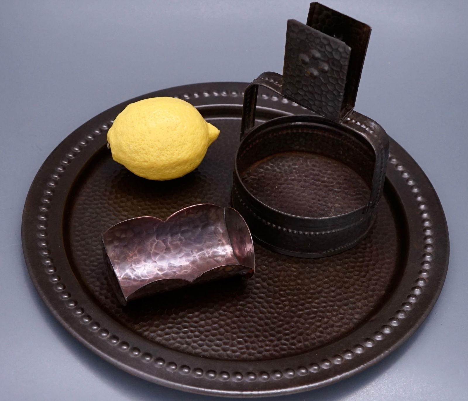 Match Holder Tray Hand Hammered Metal Smoking Utensils Including Copper Lot of 3 Items: Match Holder Tray Hand Hammered Metal Smoking Utensils Including Copper Lot of 3 Items The round tray is approximately 11 3/4 inches in diameter; the match holder is about 6 1/2 inches tall, with some