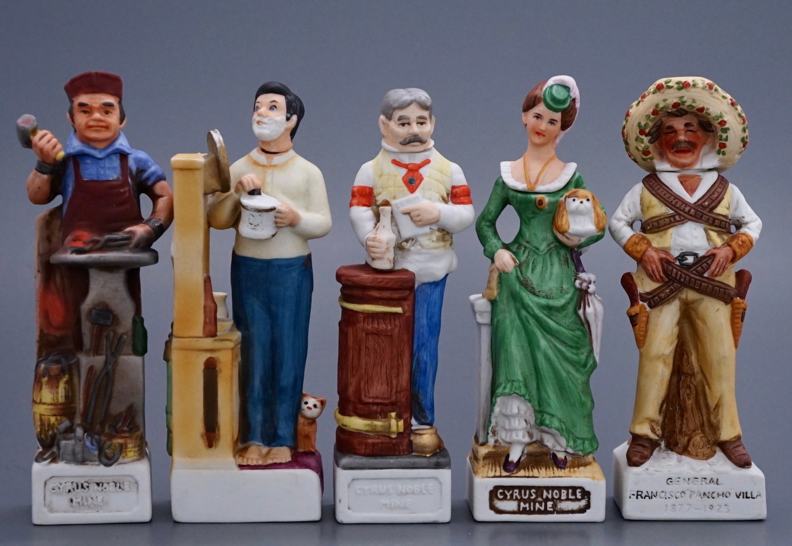 Cyrus Noble Mine Whiskey Porcelain Bottle Miniature Figural Decanters c 1970 Old West Figurines: Cyrus Noble Mine Whiskey Porcelain Bottle Miniature Figural Decanters c 1970 Old West Figurines Collection of 5 Approximately 6 1/4 - 6 1/2 inches tall. Shipping Estimate:SHIPTHEBAY estimate for shipp