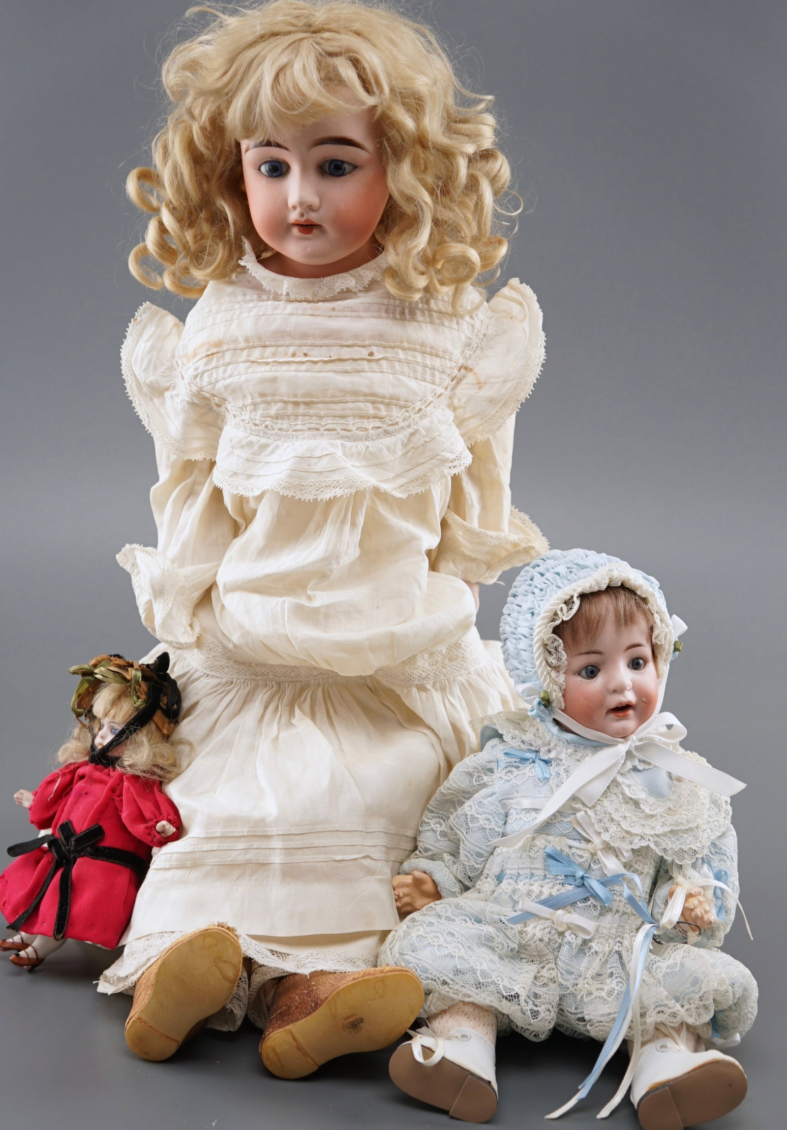 Lot of 3 Antique German Porcelain Head Dolls: Lot of 3 Antique German Porcelain Head Dolls Approximately 5 3/4, 11 and 22 inches tall. Shipping Estimate:SHIPTHEBAY estimate for shipping of this lot in the Continental US is $20, which includes pic