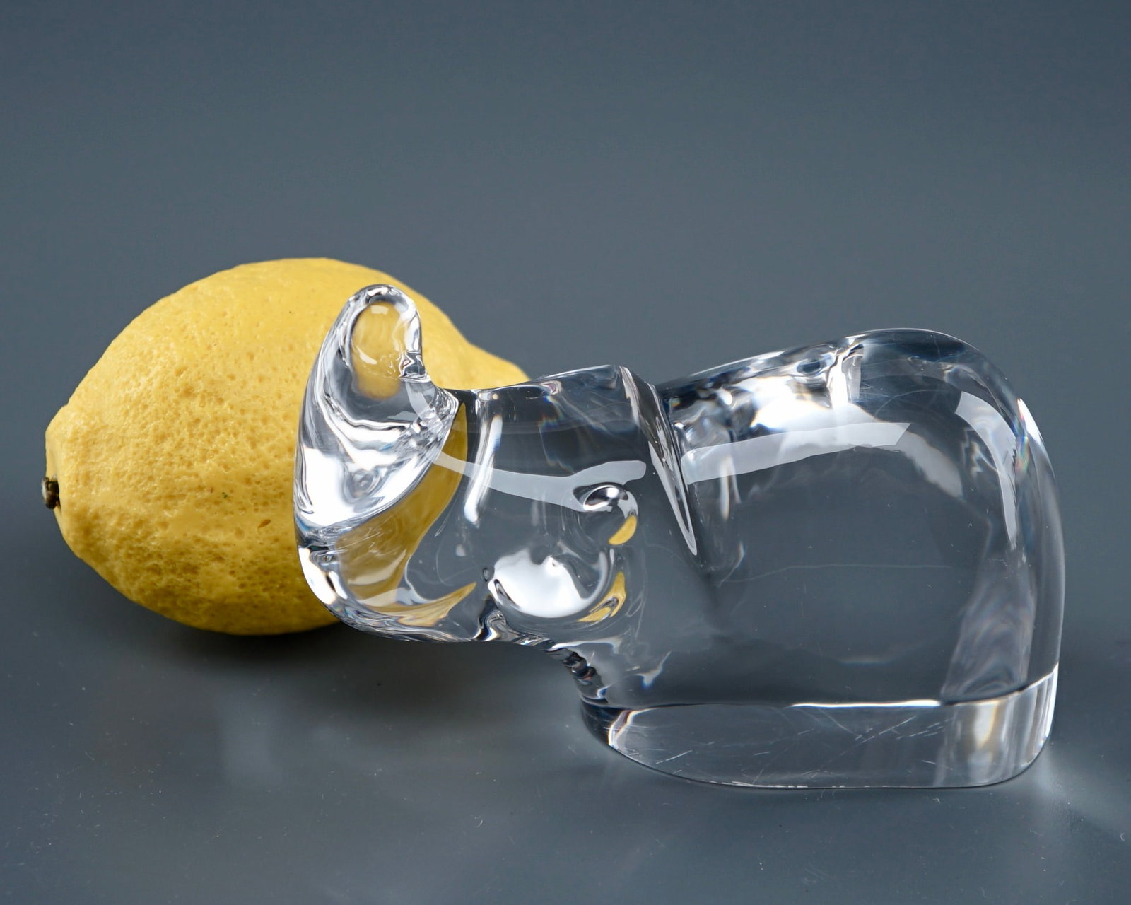 Orrefors Crystal Rhino Signed Figurine: Orrefors Crystal Rhino Signed Figurine Approximately 4 3/4 x 2 1/4 x 3 1/4 inches tall. Shipping Estimate:SHIPTHEBAY estimate for shipping of this lot in the Continental US is $20, which includes pick