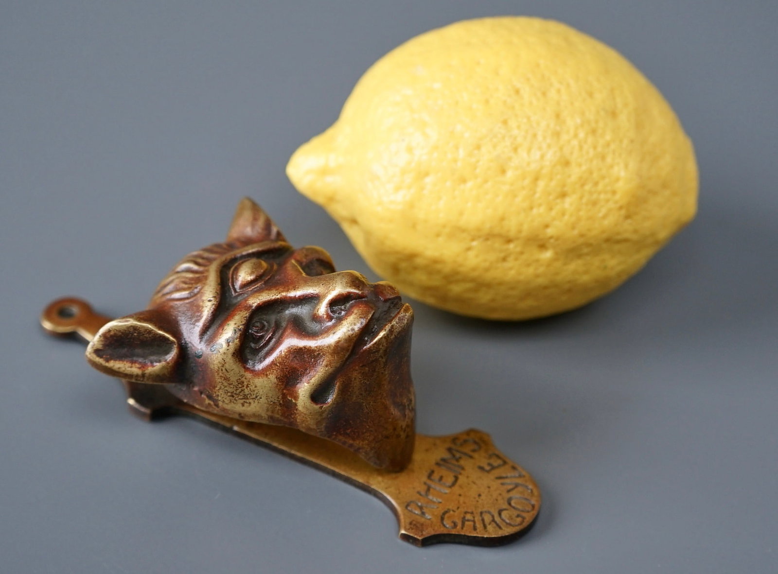 Vintage Rheims Gargoyle Brass Door Knocker c 1930: Vintage Rheims Gargoyle Brass Door Knocker c 1930 Approximately 4 3/8 x 2 inches wide x 1 3/4 inches deep. Shipping Estimate:SHIPTHEBAY estimate for shipping of this lot in the Continental US is $20, 