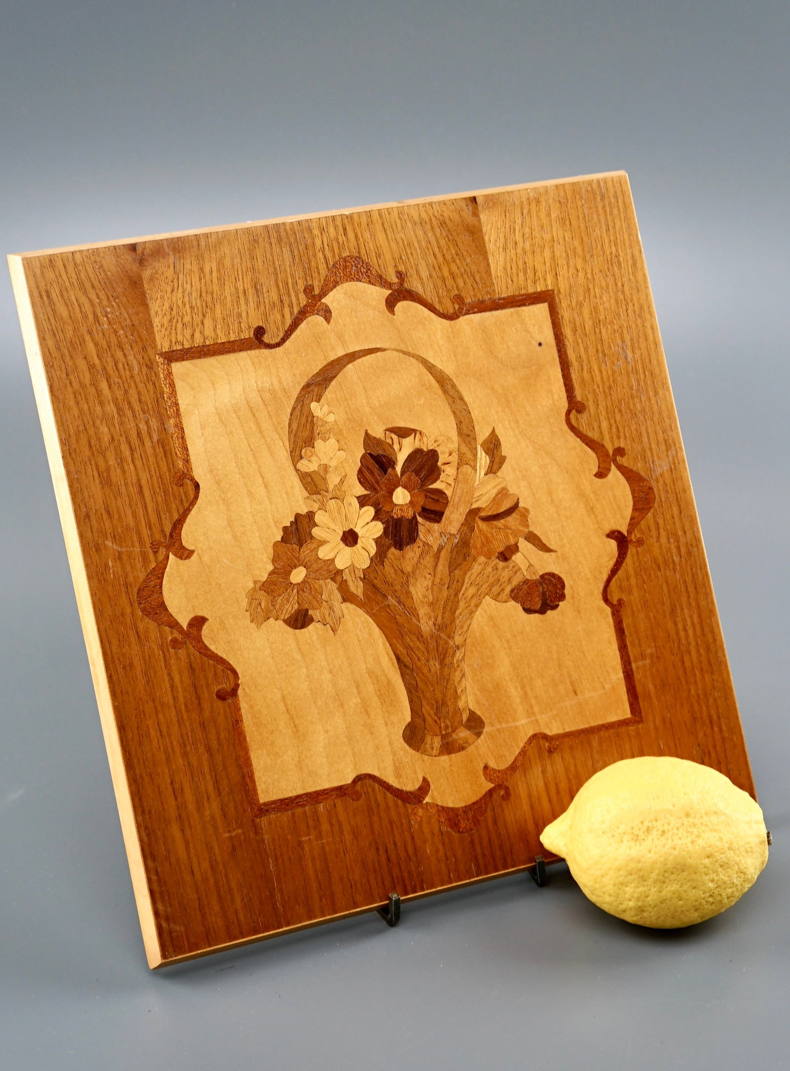 Italian Floral Basket Marquetry Veneer Wooden Wall Plaque: Italian Floral Basket Marquetry Veneer Wooden Wall Plaque Approximately 10 3/8 x 9 7/8 inches. Shipping Estimate:SHIPTHEBAY estimate for shipping of this lot in the Continental US is $20, which includ