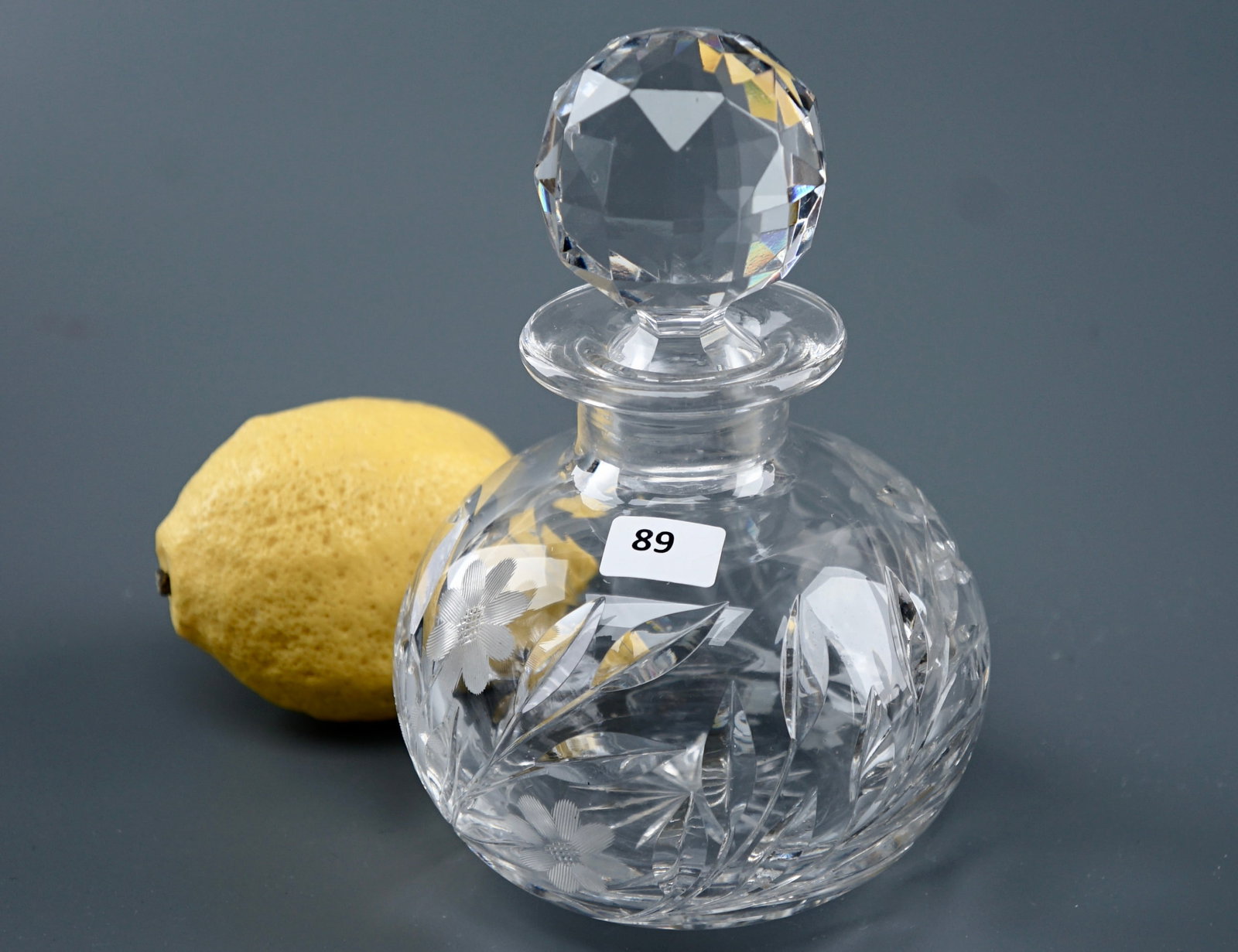 ABP Flower Period American Cut Glass Vanity Scent Bottle Faceted Ball Stopper: ABP Flower Period American Cut Glass Vanity Scent Bottle Faceted Ball StopperFine Crystal circa 1900 Approximately 6 inches tall overall. SHIPPING & PICKUP: For local customers pickup is free from 122