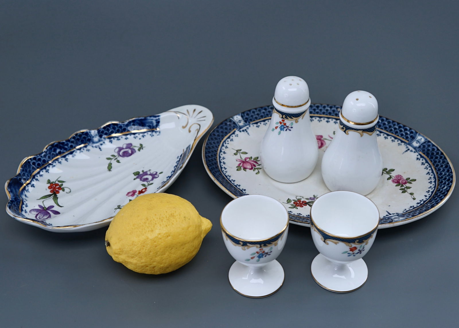 Group of China Including Wedgwood Salt Shakers and Egg Cups: Group of China Including Wedgwood Salt Shakers and Egg Cups Egg cups are approximately 2 1/2 inches tall, the salt shakers are about 3 3/4 inches tall, the oval dish is approximately 8 5/8 x 6 1/2 inc