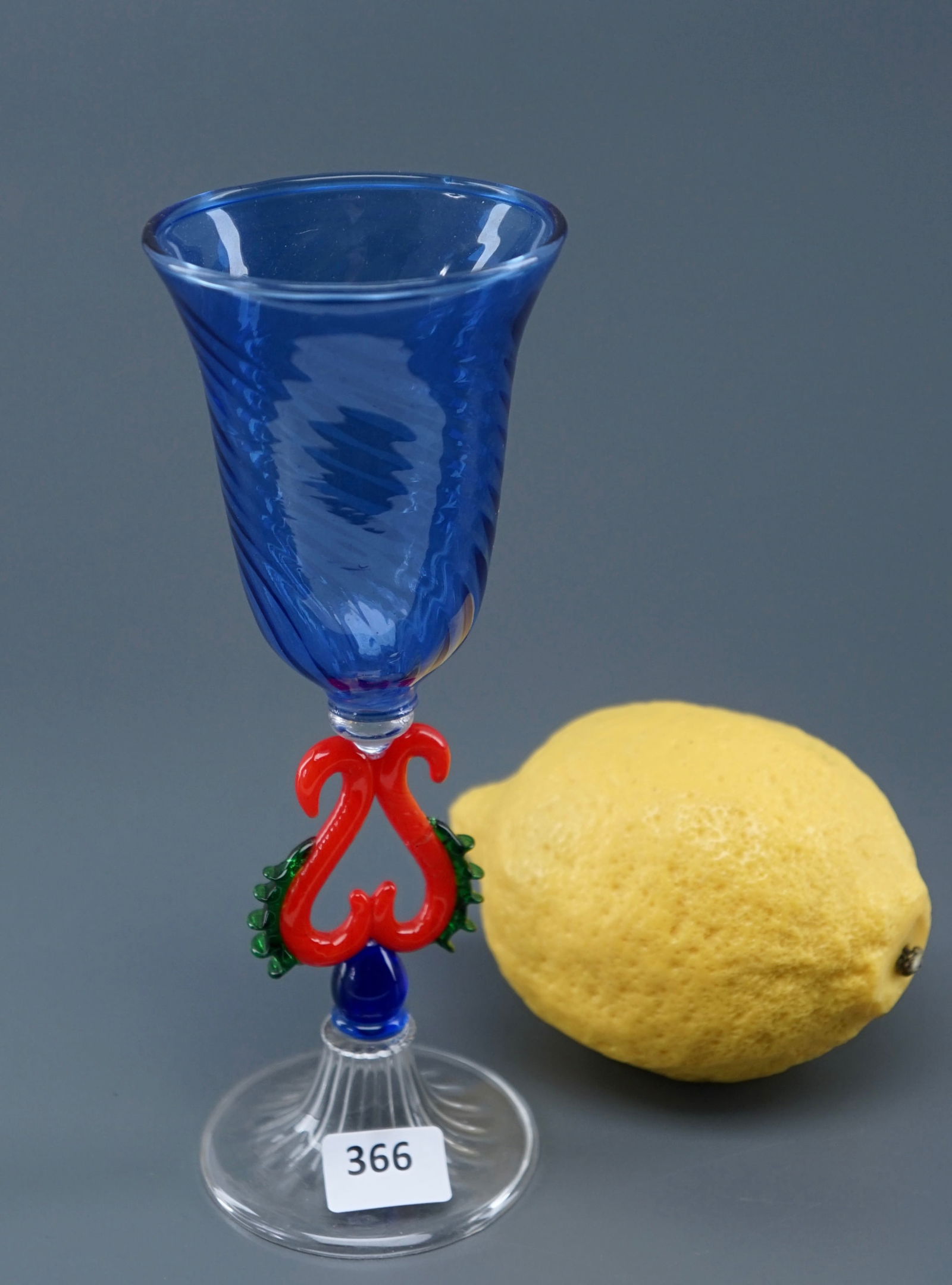 Blue Italian Style Glass Glass Toasting Goblet: Blue Italian Style Glass Glass Toasting Goblet Approximately 6 1/16 inches tall. SHIPPING & PICKUP: For local customers pickup is free from 122 North Santa Cruz Ave Los Gatos CA 95030. Shipping estima