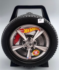 Approximately 17 Miniature Toy Cars In Tire Shaped Carrying Case