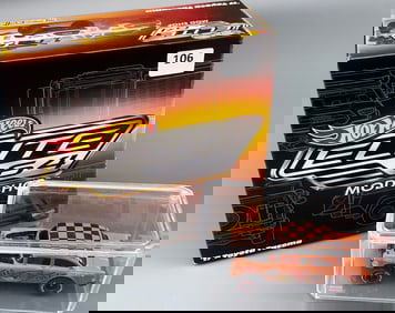 Collectors Elite 64 Mod Shop '17 Toyota Tacoma customizable die-cast model and 55 Chevy Bel Air