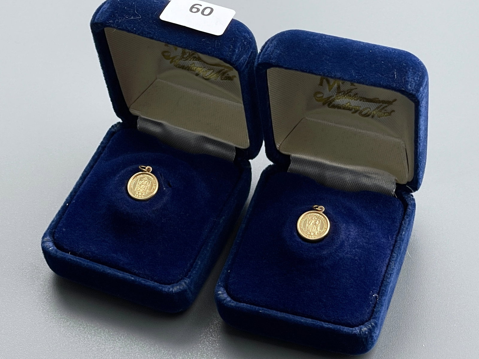 Grant Wood Gold Medallion International Monetary Mint Commemorative American Arts 1980 Miniature: Grant Wood Gold Medallion International Monetary Mint Commemorative American Arts 1980 Miniature Medal Lot of 2 Original Boxes Approximately 3/8 inches in diameter.