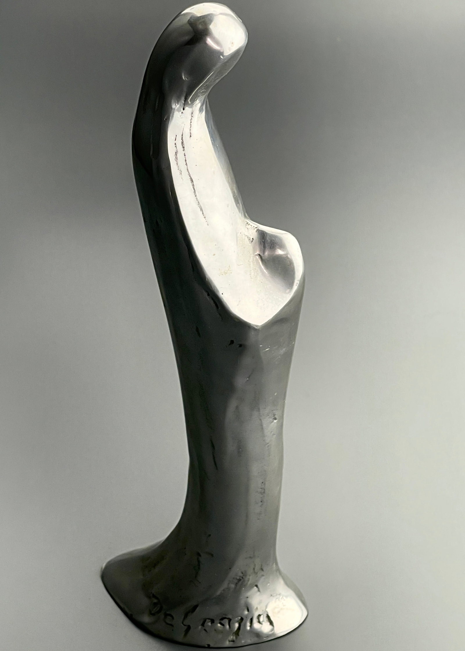 Vintage Mid Century Abstract Standing Madonna Limited Edition Figurine by Ted Degrazia Cast in: Vintage Mid Century Abstract Standing Madonna Limited Edition Figurine by Ted Degrazia Cast in Aluminum by the Nambe Mills Foundry Santa Fe, NM. Approximately 11 1/8 inches tall.