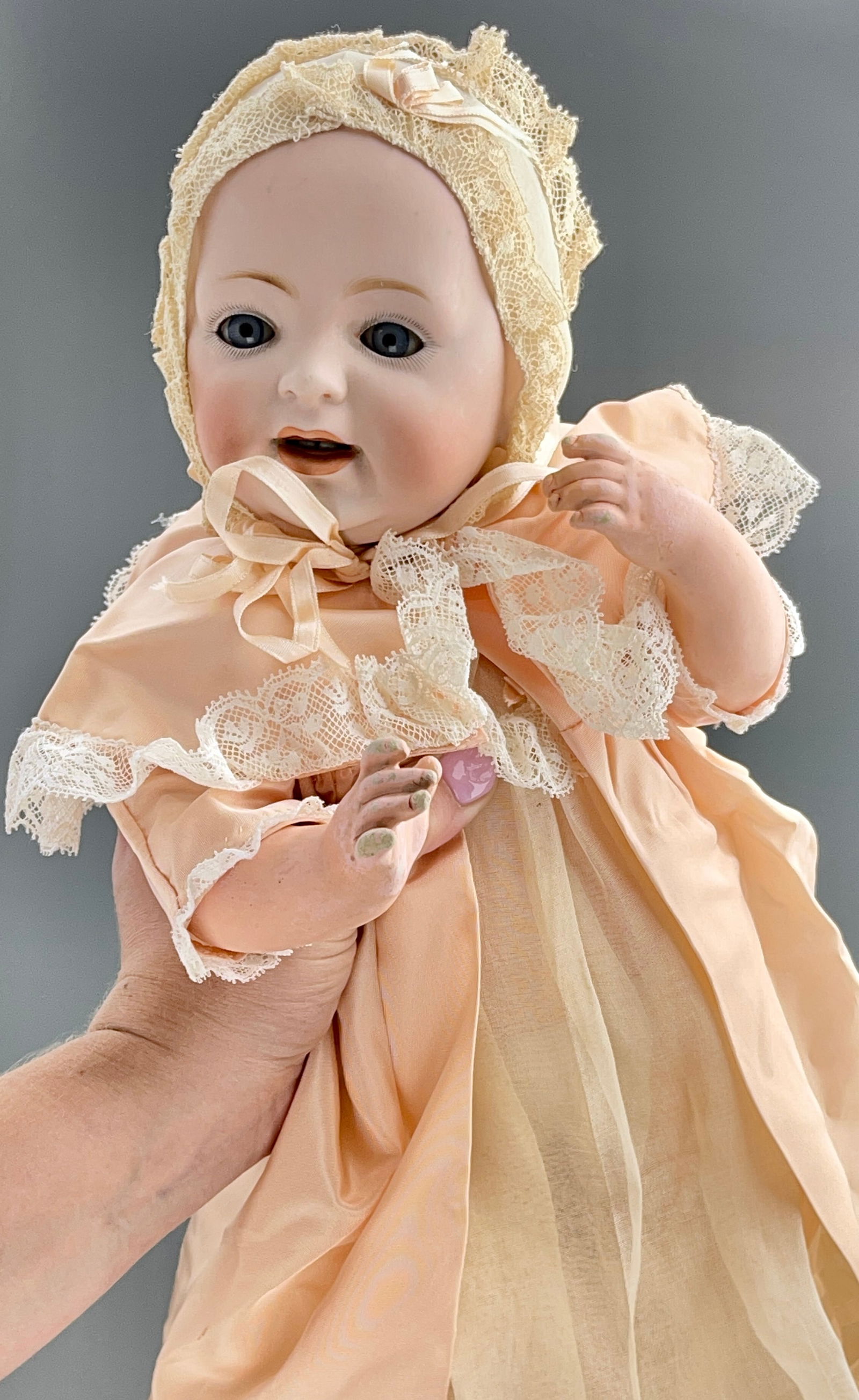 Antique Baby Doll in Pink Gown Kestner J.D.K. Germany Late 19th Century Bisque Porcelain Head Glass: Antique Baby Doll in Pink Gown Kestner J.D.K. Germany Late 19th Century Bisque Porcelain Head Glass Sleep Eyes Open Mouth With Teeth Approximately 15 inches.
