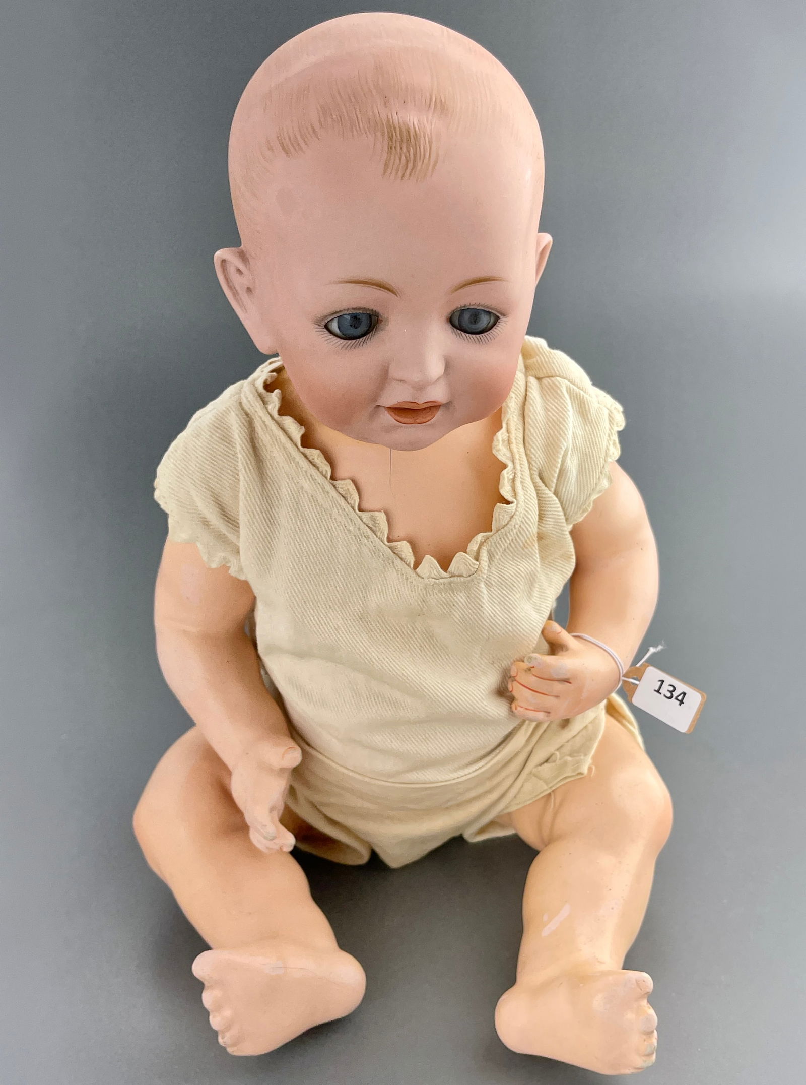 Antique German Kestner J.D.K. Bisque Socket Head Character Baby Doll Glass Sleep Eyes Painted Hair: Antique German Kestner J.D.K. Bisque Socket Head Character Baby Doll Glass Sleep Eyes Painted Hair Open Mouth With Teeth Approximately 13 1/2 inches.
