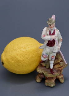 Antique Tyrolean Mountaineer German Porcelain Miniature Figurine Man in Alpine Hat: Antique Tyrolean Mountaineer German Porcelain Miniature Figurine Man in Alpine Hat Approximately 4 5/8 inches tall.