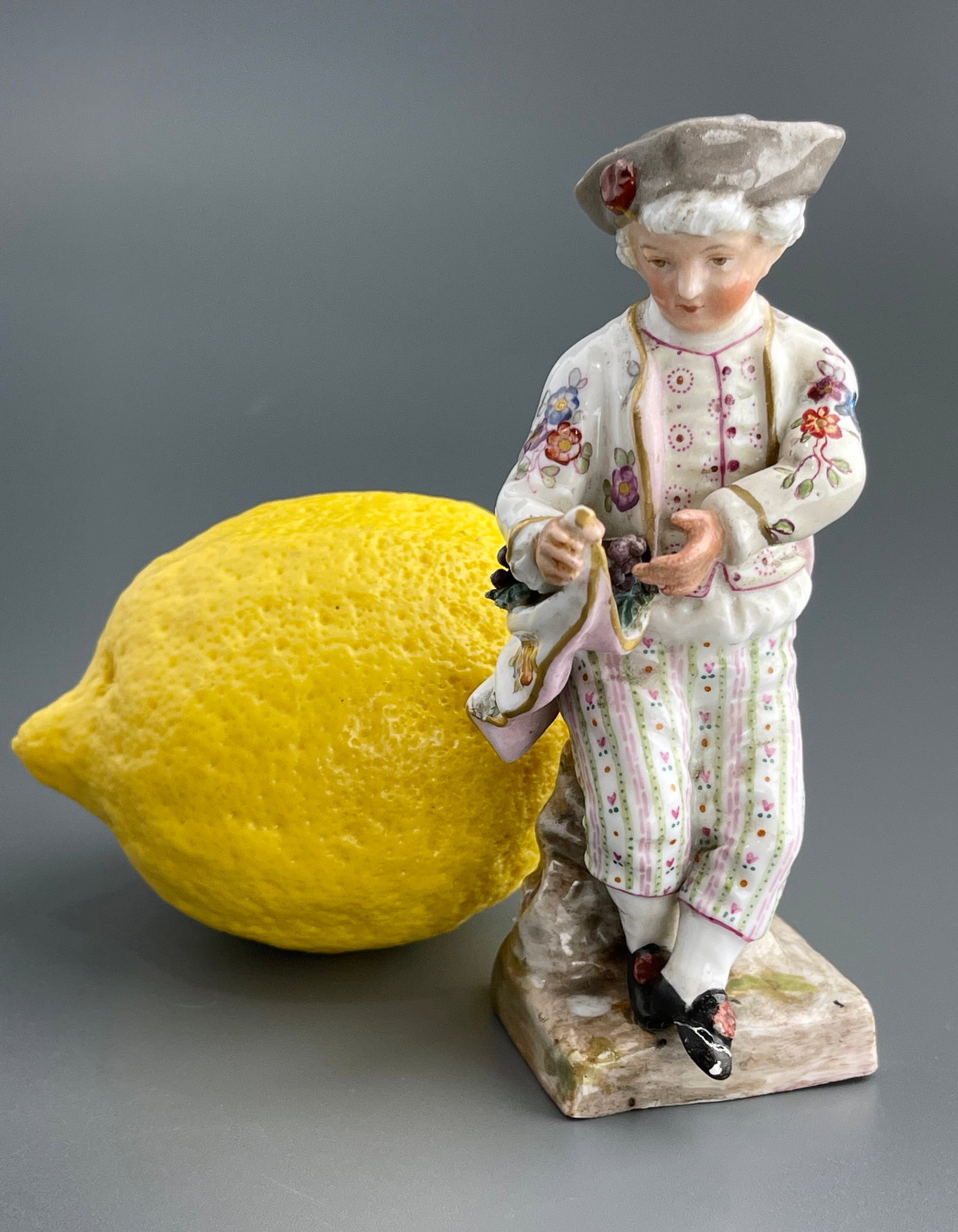 Antique German Meissen Style Volksted Porcelain Miniature Gardener Figurine: Antique German Meissen Style Volksted Porcelain Miniature Gardener Figurine Approximately 4 3/8 inches tall.
