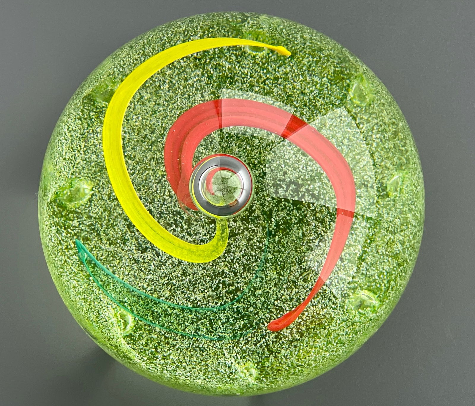 Caithness Wheel of Fortune Art Glass Paperweight Made in Scotland: Caithness Wheel of Fortune Art Glass Paperweight Made in Scotland Approximately 2 7/8 inches tall.