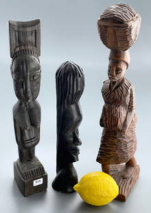Primitive African Style Wood Carving Lot of 3 Vintage Carved Figurines: Primitive African Style Wood Carving Lot of 3 Vintage Carved Figurines Approximately 13 1/6, 10 1/4 and 14 1/4 inches tall.