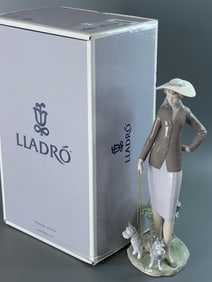 Lladro Walking the Dog #01006760 Spanish Name El Paseo Diario Sculptor Regino Torrijos Year Issued