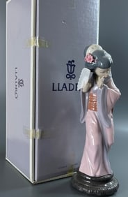 Lladro 4990 Timid Japanese Geisha Medium Sized Porcelain Fgurine Depicting a Japanese Geisha