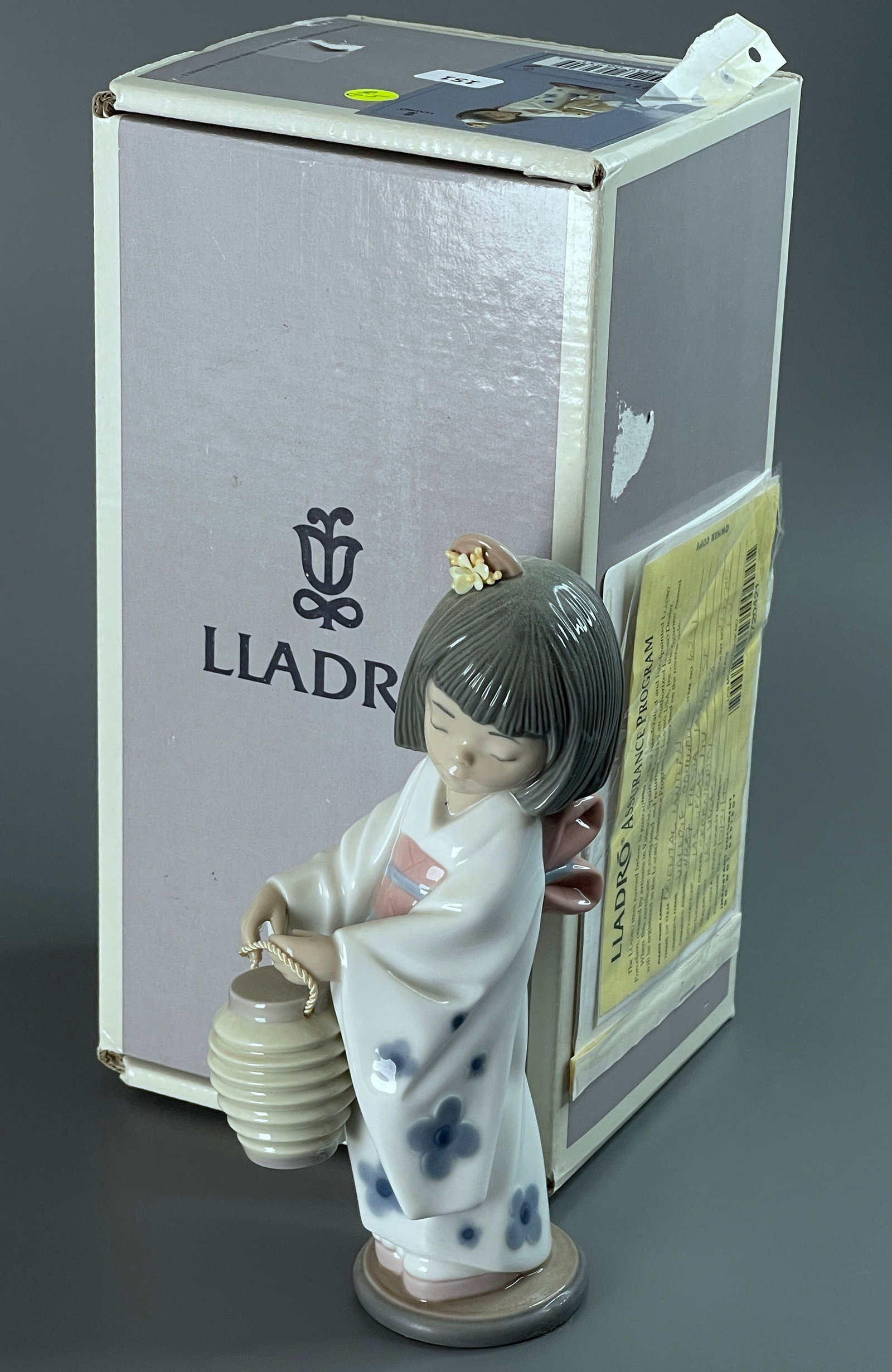 Lladro Porcelain Figurine Titled Oriental Lantern Item Number 01006231 Featuring a Young Girl in a: Lladro Porcelain Figurine Titled Oriental Lantern Item Number 01006231 Featuring a Young Girl in a Traditional Kimono Holding a Paper Lantern Retail Price $150.00